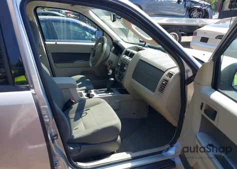 2009 Ford Escape Xlt z USA, uszkodzony, nr VIN 1FMCU037X9KA81564